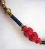 Red, Blue and Gold Wood and Plastic Tribal Necklace - D & L  Vintage 